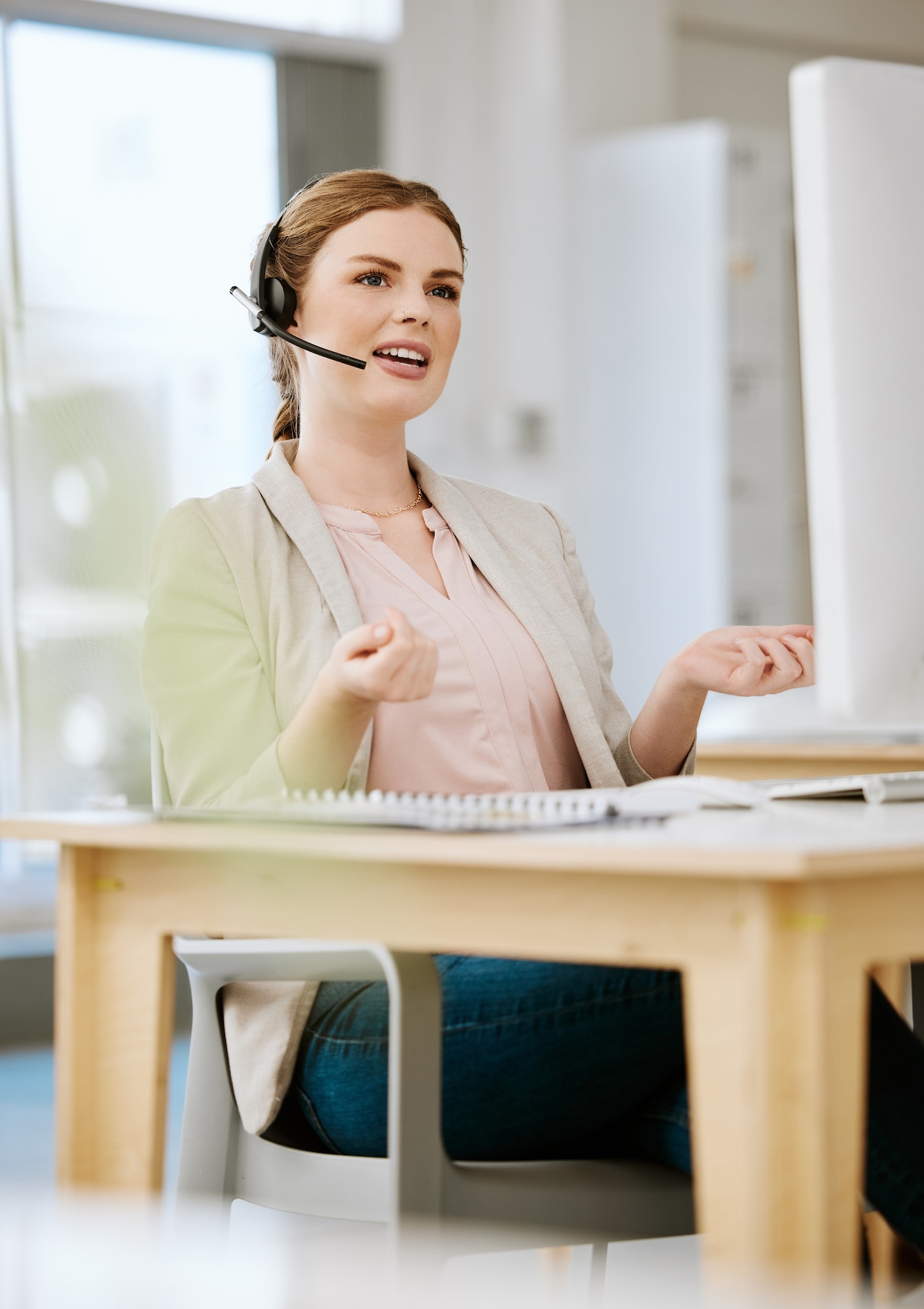 Insurance agent, call center or contact support employee giving good customer service via her heads